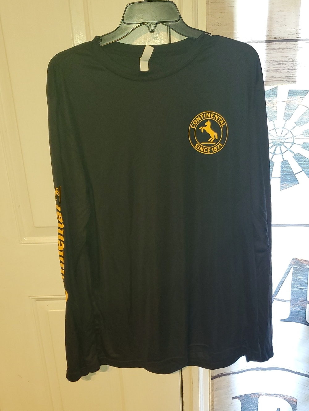 Continental Men's Black Long Sleeve Tee with Gold Crest